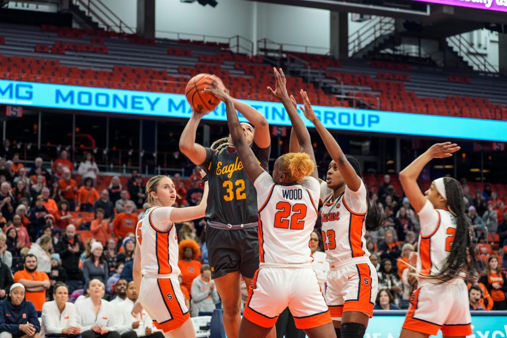 The Orange defense swarming BC foward Teya Sideberry on her shot attempt. Sideberry had eight points in the first quarter and four for the remainder of the contest. 
