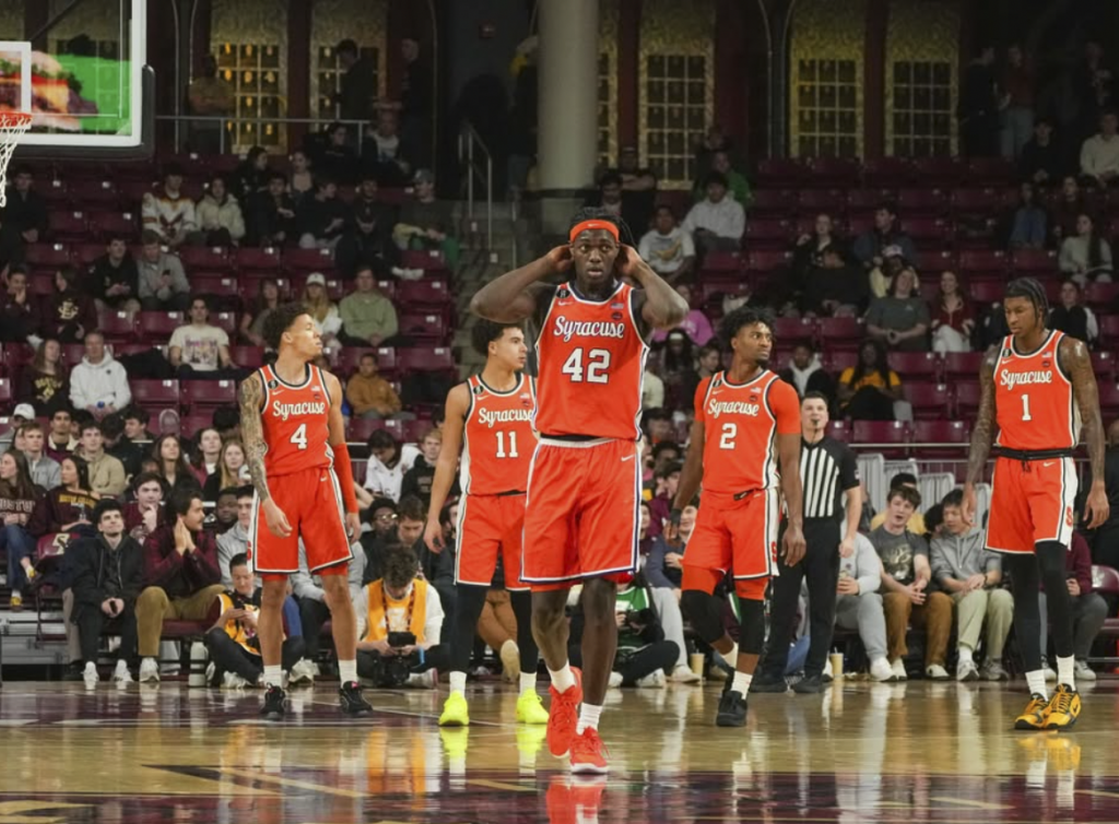 The Orange react after a foul is called on William Kyle III
