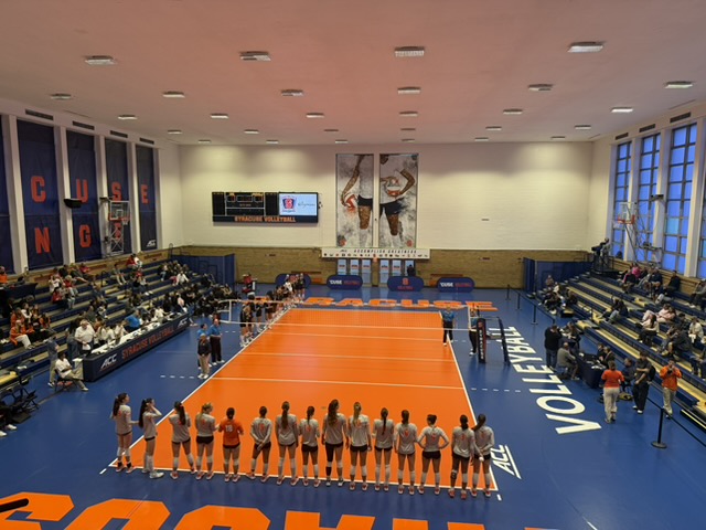 Teams line up on the court